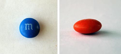 A top down and side view of two M&M candies