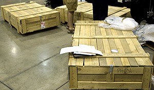 Three large wooden shipping crates