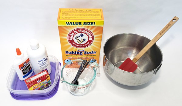 Glue, contact solution, food coloring, measuring spoons, baking soda, measuring cup, a spatula and a mixing bowl