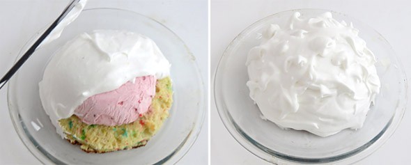 Meringue is spread over ice cream on a cake