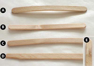 Common defects found in popsicle sticks include those that are bowed, bent, broken and have knots