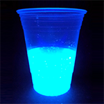 Tonic water glowing under black light