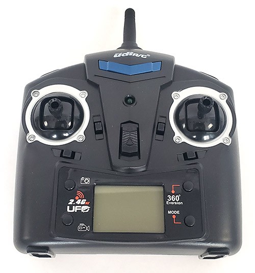 A handheld drone controller with two joysticks.