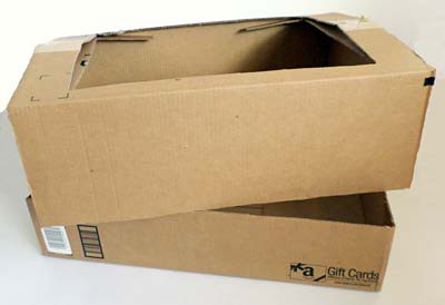 A cardboard box is split into a base and a lid