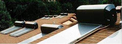 A photograph showing thermosiphon solar water heaters on employee housing at Yosemite National Park.