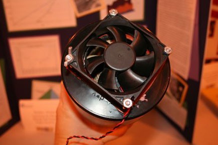 A computer fan attached to a cap