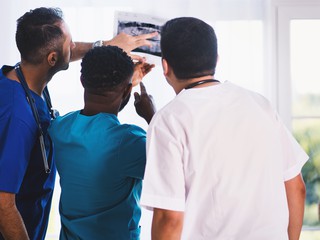 nurses examining scan