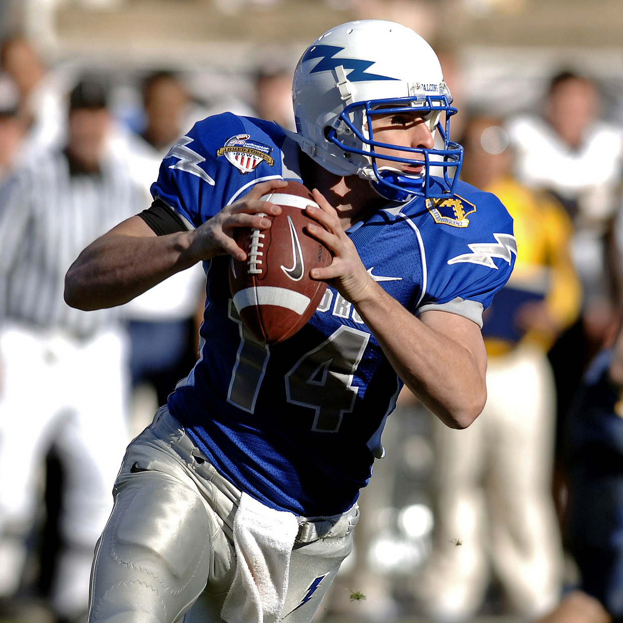 Quarterback throwing football to represent Super Bowl Science Experiments