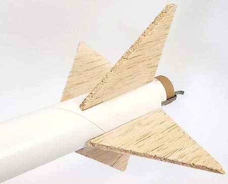 Fins taped to rocket body with clear tape