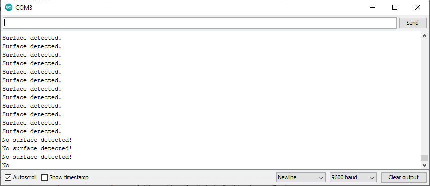 Arduino serial monitor displaying 'Surface detected.' And 'No surface detected!' text.