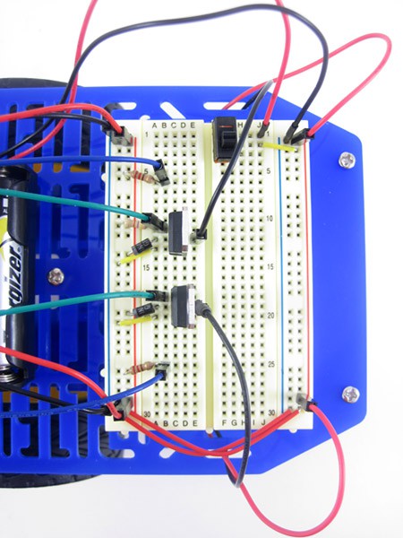 A fully wired breadboard for a line-following robot