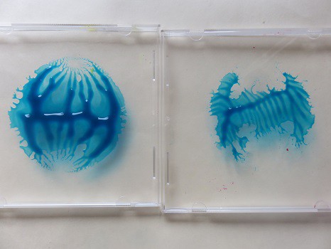 Finger paint on a blank, empty CD jewel case