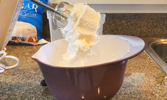 Icing that sticks as a clump to the mixing blades of a mixer. 