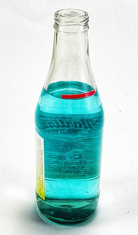 bottle mostly full of colored water