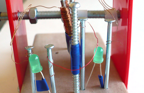 Electric generator close-up showing electromagnet and generator parts