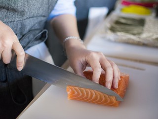 salmon being cut