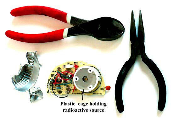 Tools used to remove the metal on a radioactive source housing