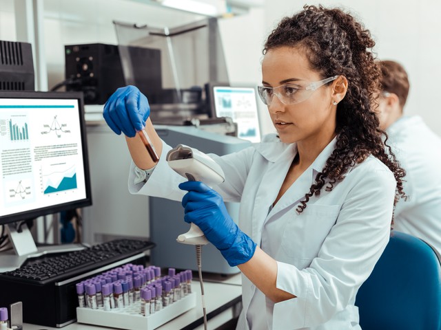 laboratory technician receiving samples for analysis