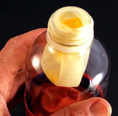 Lung model while a piece of gelatin  almost completely blocking the entrance to the balloon.