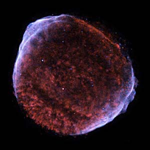 A color-adjusted image of remnants from the Chandra supernova SN 1006 appear as a blue and red sphere