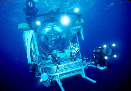 Photo of a large robot being operated underwater