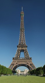 the Eiffel tower, a tall tower made from trusses that is wider at the base than at the top