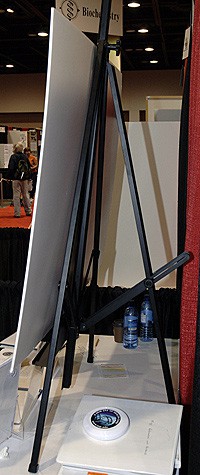 A display board on a tripod board stand