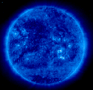 An ultraviolet image of the sun appears blue