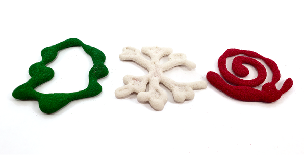 Snowflake, leaf, and seasonal shapes made with sand and glue