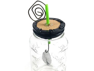Electroscope built from a jar, metal wire, straw, and aluminum pieces.