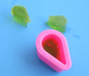 Green Jell-O cut from a tear drop shaped mold