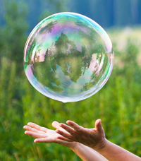 2012-hand-catching-a-soap-bubble-crop.png