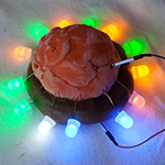 Squishy circuit sculpture with multiple LEDs lit up