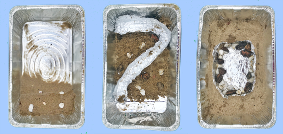 Three sample models of bodies of water made in aluminum pans
