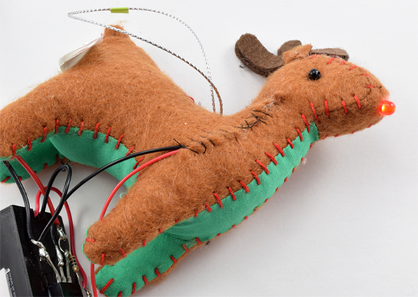 A reindeer ornament with a sensor-based circuit