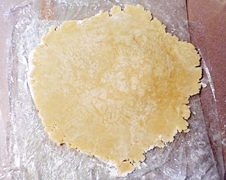 Dough is rolled out into a general circle shape