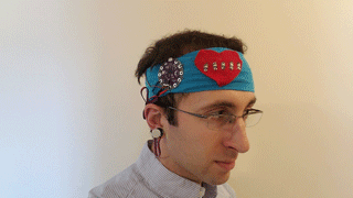 Animated image of a man wearing a heartbeat monitor on a headband